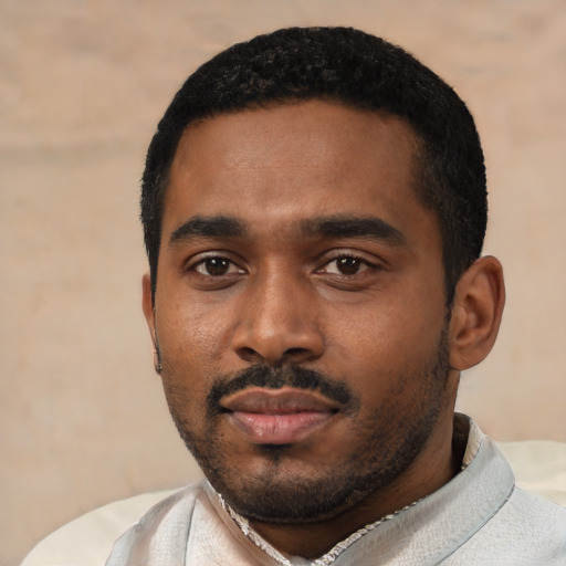 Neutral black young-adult male with short  black hair and brown eyes