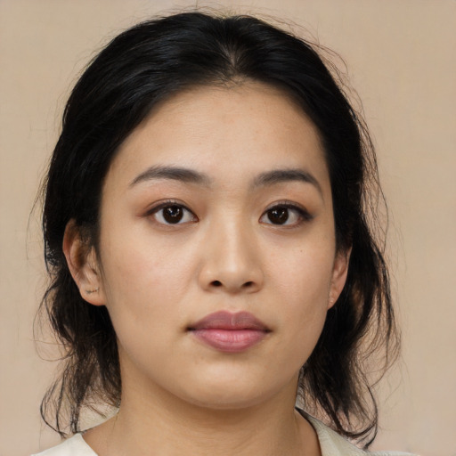 Neutral asian young-adult female with medium  black hair and brown eyes