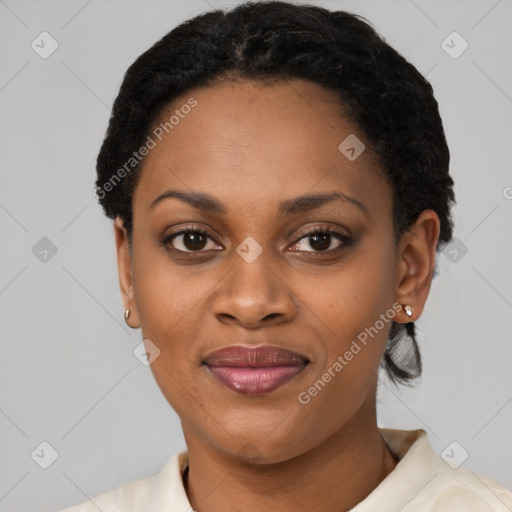 Joyful latino young-adult female with short  black hair and brown eyes