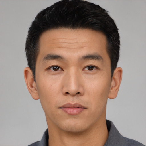 Neutral asian young-adult male with short  black hair and brown eyes