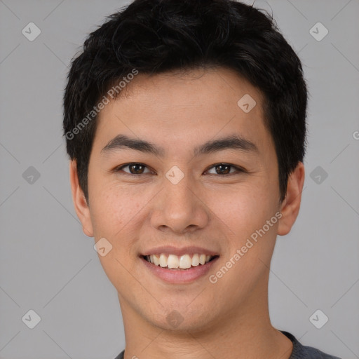 Joyful white young-adult male with short  black hair and brown eyes