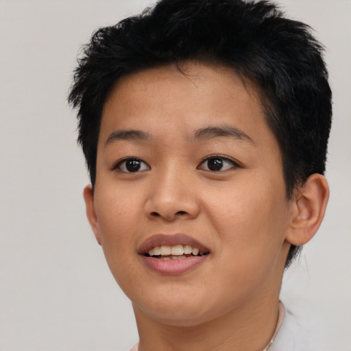Joyful asian young-adult female with short  black hair and brown eyes