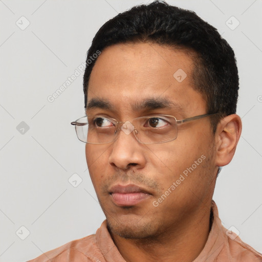 Neutral asian adult male with short  black hair and brown eyes