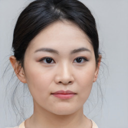 Neutral asian young-adult female with medium  brown hair and brown eyes