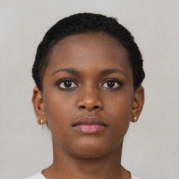 Neutral black young-adult female with short  brown hair and brown eyes