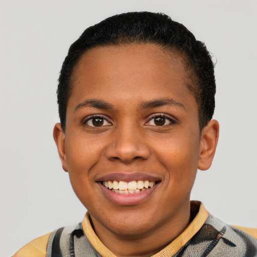 Joyful black young-adult female with short  black hair and brown eyes