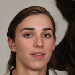 Neutral white young-adult female with medium  brown hair and brown eyes