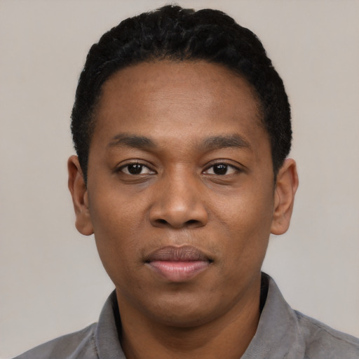 Neutral black young-adult male with short  black hair and brown eyes