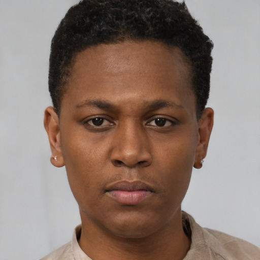 Neutral black young-adult male with short  brown hair and brown eyes