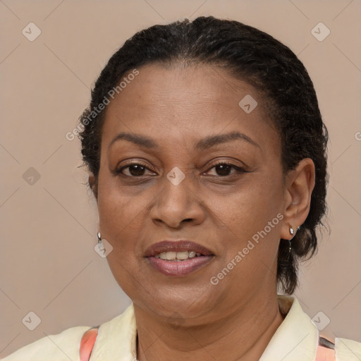 Joyful latino adult female with short  brown hair and brown eyes