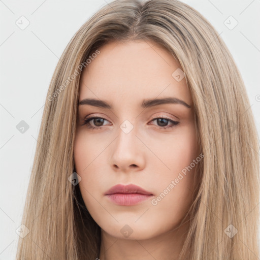 Neutral white young-adult female with long  brown hair and brown eyes