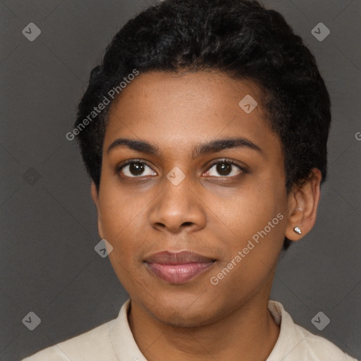 Joyful black young-adult female with short  black hair and brown eyes