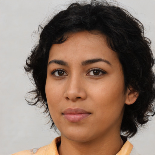 Neutral latino young-adult female with medium  black hair and brown eyes