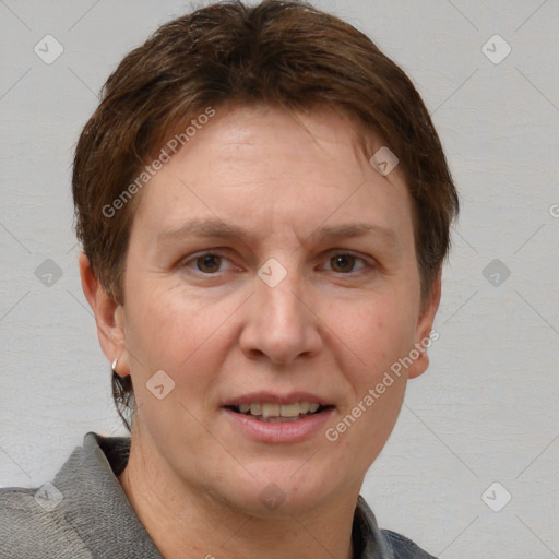 Joyful white adult female with short  brown hair and brown eyes