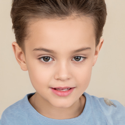 Joyful white child female with short  brown hair and brown eyes