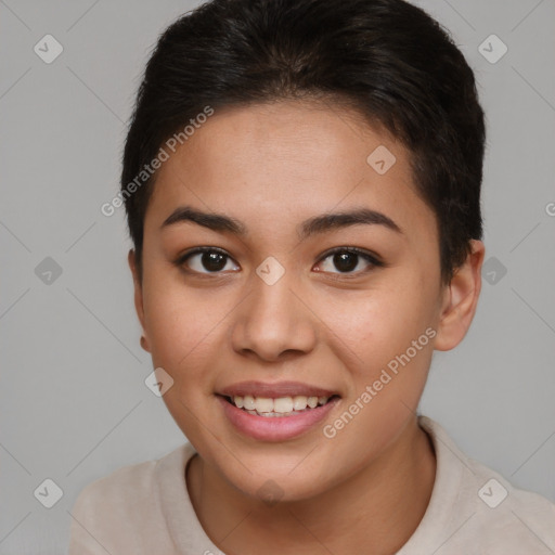 Joyful asian young-adult female with short  brown hair and brown eyes