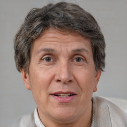 Joyful white middle-aged male with short  brown hair and brown eyes