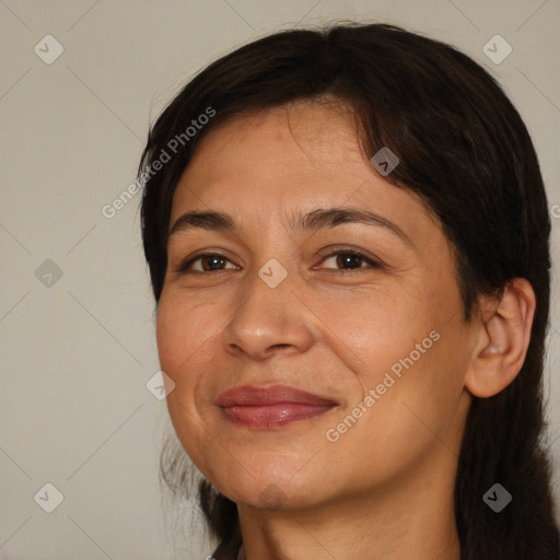 Joyful white adult female with medium  brown hair and brown eyes