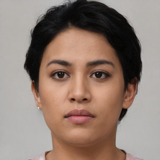 Neutral latino young-adult female with short  black hair and brown eyes