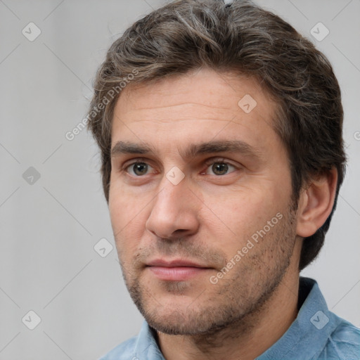 Neutral white adult male with short  brown hair and brown eyes