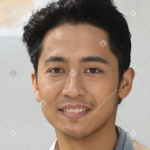 Joyful asian young-adult male with short  brown hair and brown eyes