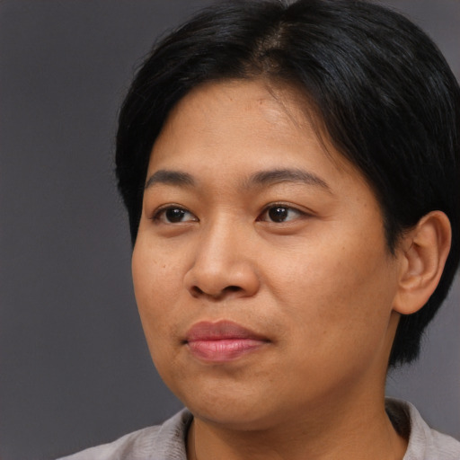 Neutral asian young-adult female with short  black hair and brown eyes