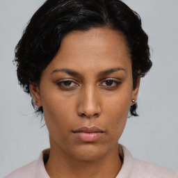 Neutral asian young-adult female with short  black hair and brown eyes