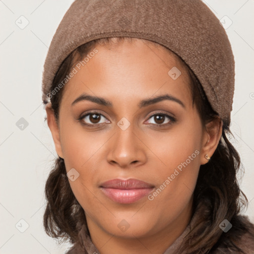 Joyful latino young-adult female with long  brown hair and brown eyes