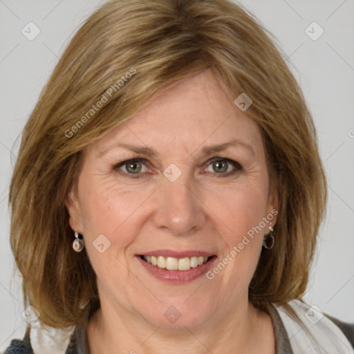 Joyful white adult female with medium  brown hair and grey eyes