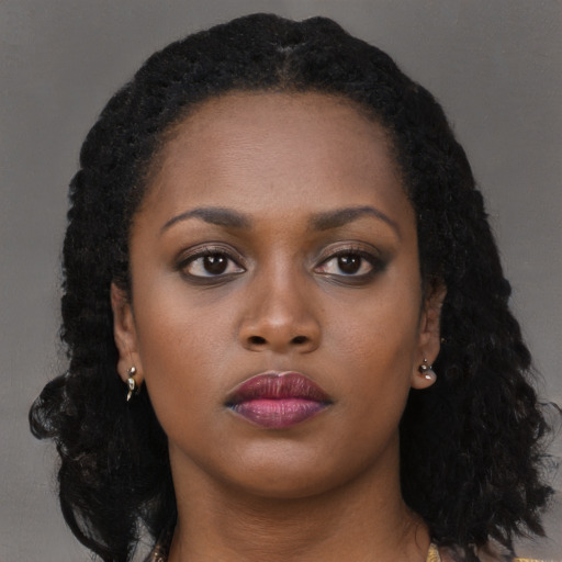 Neutral black young-adult female with long  black hair and brown eyes