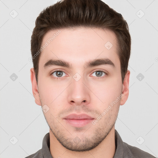 Neutral white young-adult male with short  brown hair and brown eyes