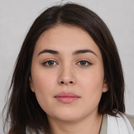 Neutral white young-adult female with medium  brown hair and brown eyes