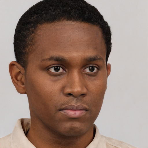 Neutral latino young-adult male with short  brown hair and brown eyes