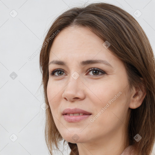 Joyful white young-adult female with medium  brown hair and brown eyes