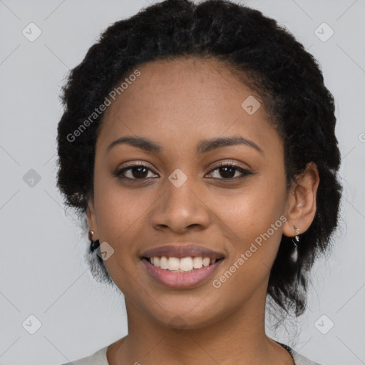 Joyful latino young-adult female with long  black hair and brown eyes