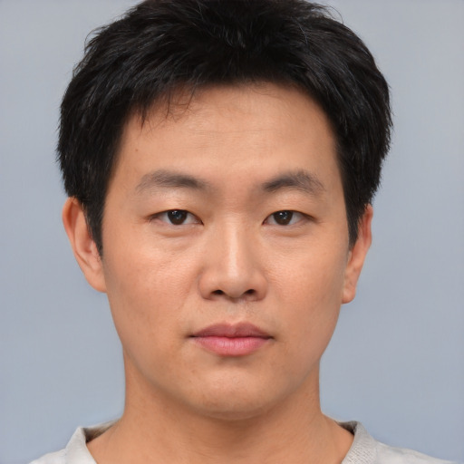 Neutral asian young-adult male with short  black hair and brown eyes