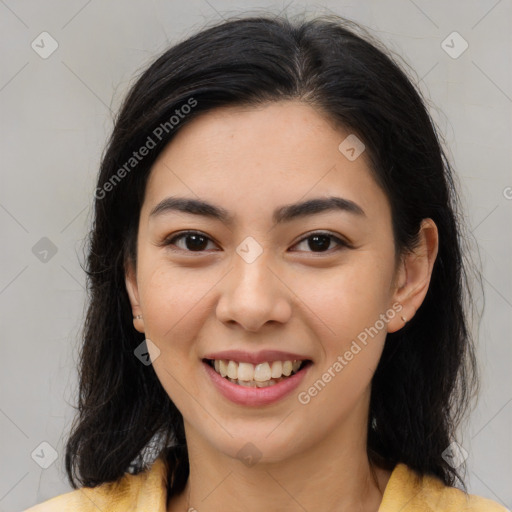 Joyful asian young-adult female with medium  brown hair and brown eyes