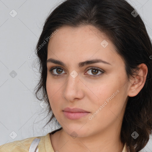 Neutral white young-adult female with medium  brown hair and brown eyes
