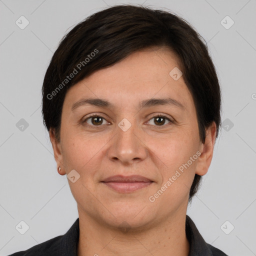 Joyful white adult female with short  brown hair and brown eyes