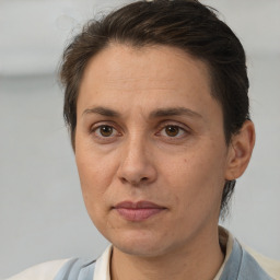 Joyful white adult female with short  brown hair and brown eyes