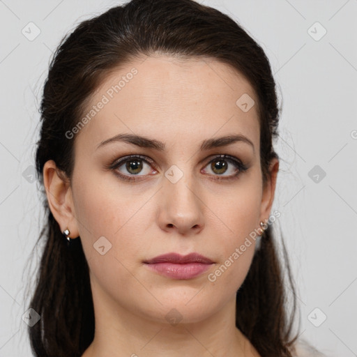 Neutral white young-adult female with long  brown hair and brown eyes