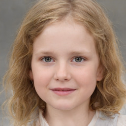 Joyful white child female with medium  brown hair and grey eyes