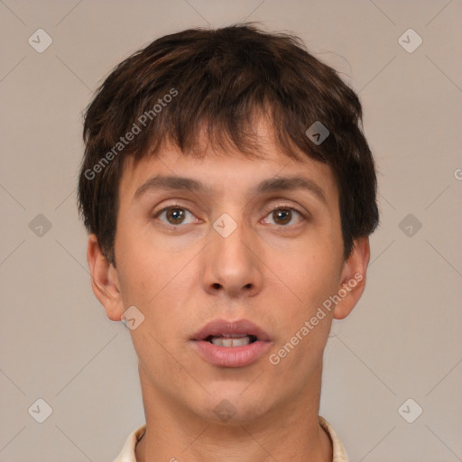 Neutral white young-adult male with short  brown hair and brown eyes