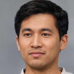 Neutral asian young-adult male with short  black hair and brown eyes