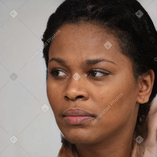 Neutral black young-adult female with short  black hair and brown eyes