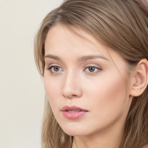 Neutral white young-adult female with long  brown hair and grey eyes