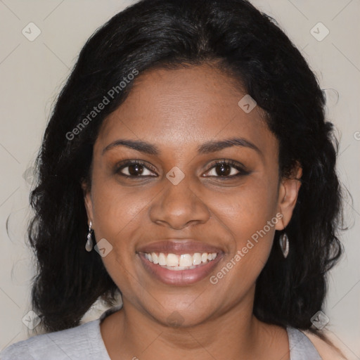 Joyful black young-adult female with medium  black hair and brown eyes