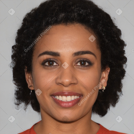 Joyful latino young-adult female with short  black hair and brown eyes