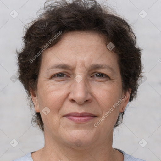 Joyful white adult female with short  brown hair and brown eyes