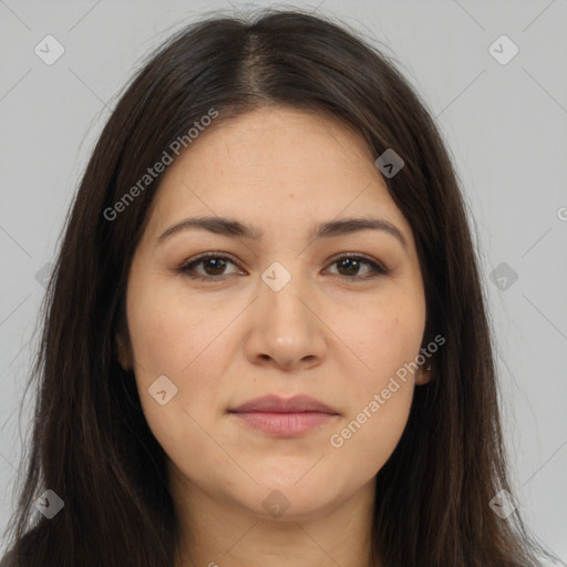 Joyful white young-adult female with long  brown hair and brown eyes